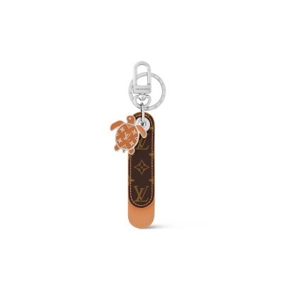 LOUIS VUITTON DRAGONNE TAB KEY HOLDER AND BAG CHARM M02565